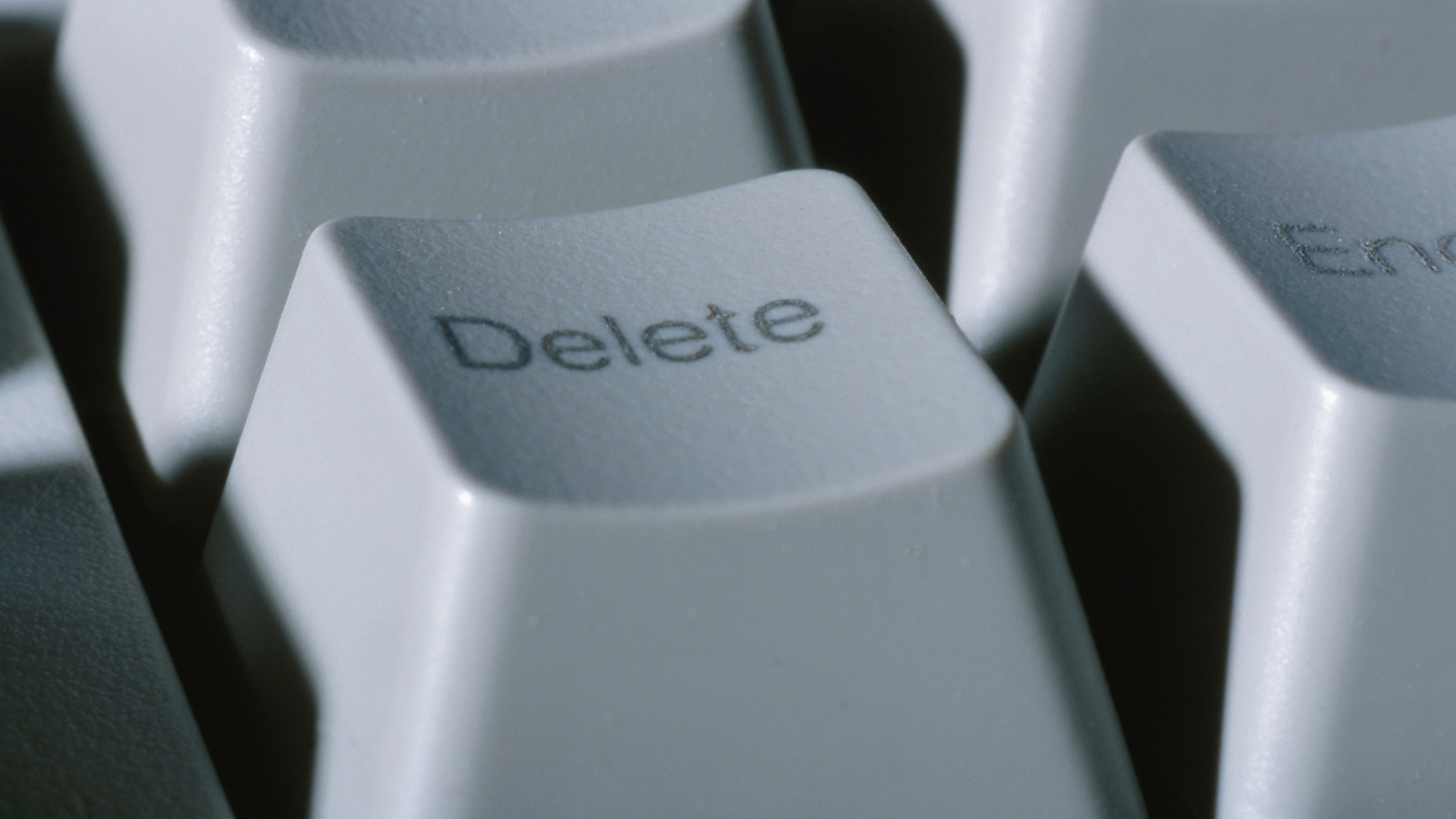 A computer keyboard "Delete" key.