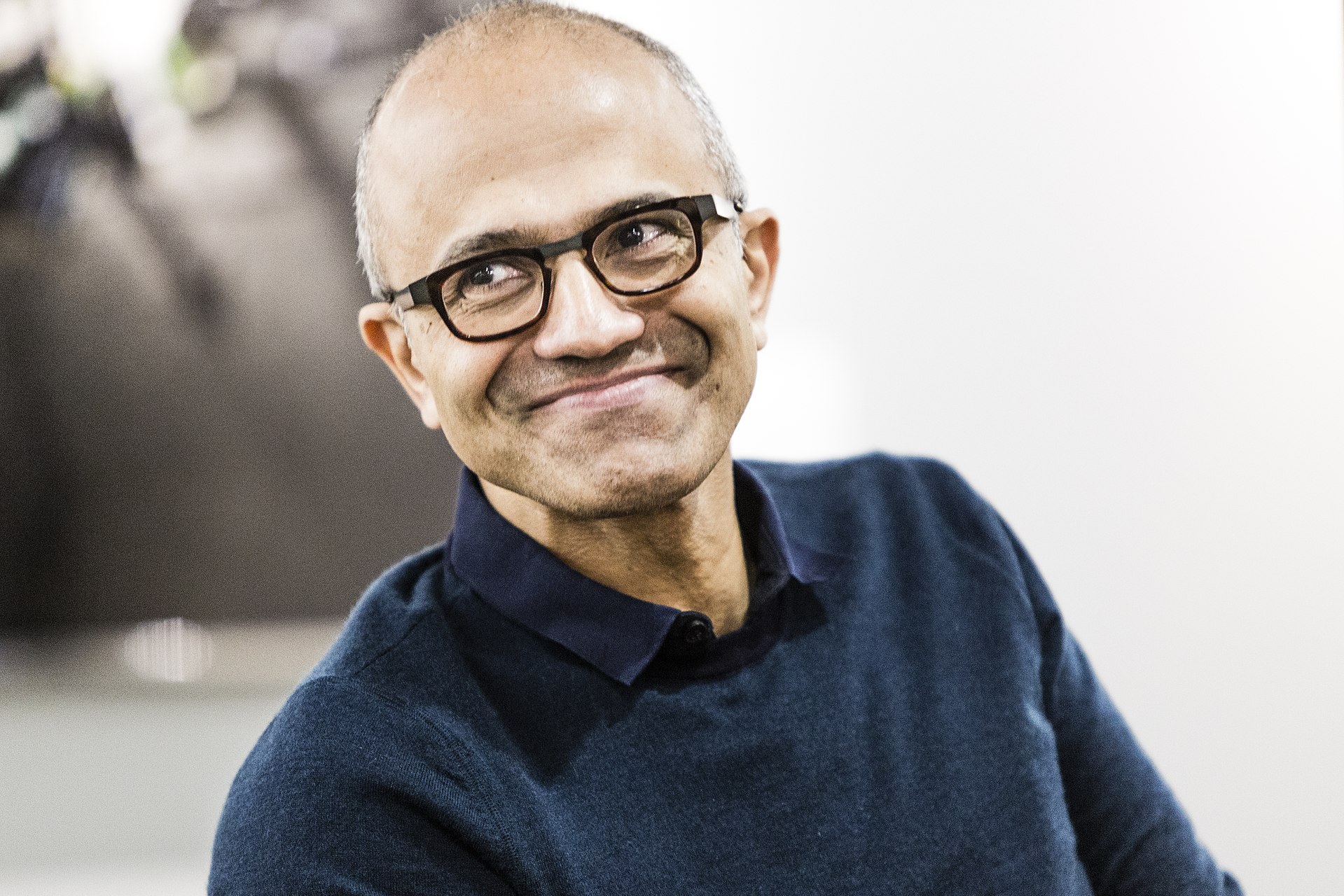 Microsoft CEO Satya Nadella smiling.